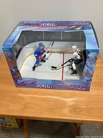 Front view of sealed 1998 Starting Lineup Freeze Frame One-on-One box with figures visible