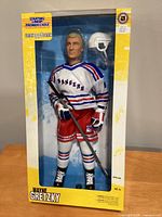 Front of sealed box showing Wayne Gretzky figure with accessories