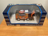 Boxed 1:24-scale New York Islanders Zamboni bank showing unopened packaging and graphics