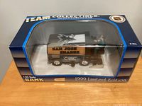 Sealed box displaying 1:24 scale San Jose Sharks Zamboni coin bank, 1999 limited edition labeling