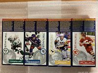 Back panels showing Kariya, Messier, Jagr, Fleury cards