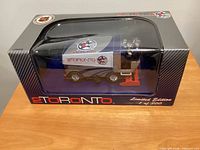 Front view of boxed limited edition 1:24 scale Zamboni coin bank