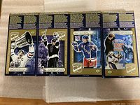 Back panels of all four Gretzky boxes showing event images and summaries