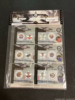 Front of sealed package displaying six stamp cards