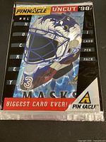 Sealed Pinnacle 1998 Uncut Mask card showing Colorado Avalanche mask artwork