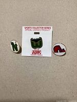 Front view of three enamel NHL logo pins, Hartford Whalers pin on original card