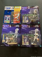 Front view of four sealed Starting Lineup MLB figurines on cards showing players John Olerud, David Cone, Tino Martinez, Chan Ho Park