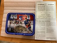 Front of collector plate with certificate of authenticity