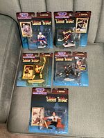 All five sealed 1998-99 NHL Canadian Timeless Legends figures displayed