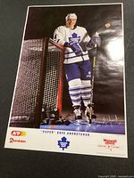 Front view of Dave Andreychuk promotional poster showing full design and sponsor logos