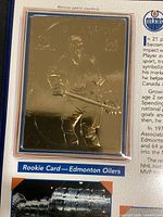 Gold rookie card in protective case, Edmonton Oilers image