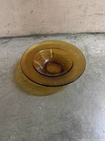 Top view showing amber glass bowl with ribbed pattern