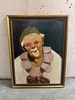 Front view of framed clown portrait