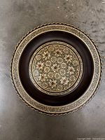 front view showing full geometric inlay design