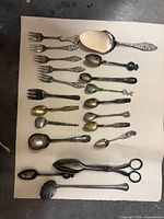 Group shot of all utensils laid out on white board