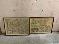 Both framed map prints side by side for scale and overall view