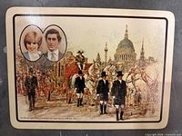 Front of placemat showing illustration and portraits