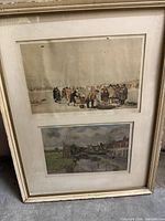 Full view of framed item showing both prints