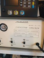 Front panel showing Midland Model 23-170 label, magic-eye, controls