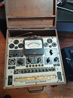 Full view of Precision Series 920 tube tester in open wooden case