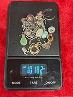 Entire lot on digital scale reading 1.018 oz