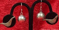 front view of both earring pairs on display stand