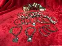 overview of all bracelets on red fabric