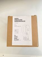 Box front with specification label 70W high pressure sodium bulb, 2100K, 6500 lumens