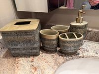 Full 5-piece bathroom set arranged on countertop