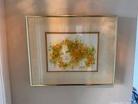 Frontal view of framed watercolour showing artwork, matting and frame