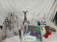 Group shot of all items including stands, tape dispensers, and photo pages