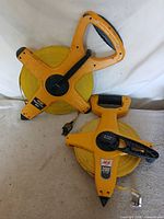 Both tape measures showing overall design and size