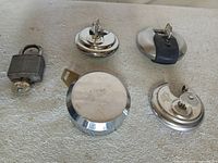 Group shot of all five padlocks and keys
