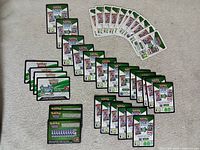 All code cards laid out on carpet, showing quantity and different front designs