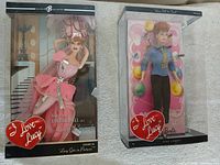 Front view of both boxed Barbie Collector I Love Lucy dolls