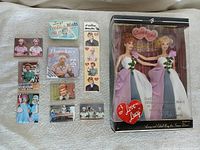 Group showing entire lot: giftset, magnets, mint tin, coaster set, sticker sheet