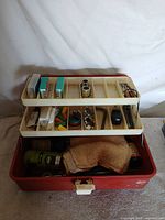 Open tool box showing trays and contents