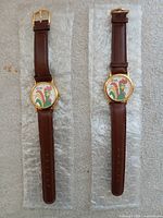 Both watches side by side in bubble wrap