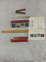All four items laid out with cases and instruction sheet