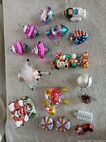 Group shot of all fifteen ornaments spread on surface