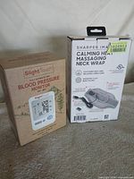 Front view of both boxed items