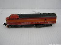 Side view showing Southern Pacific livery and road number 6303