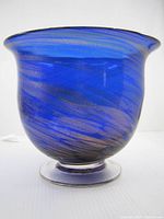Side view showing cobalt blue color and copper aventurine swirls