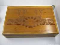 Top view showing full carved motif and wood grain