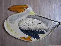 front view of hand-painted pelican tray
