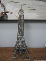 Full view of metal Eiffel Tower sculpture front