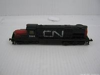 Side view of CN 2563 diesel locomotive