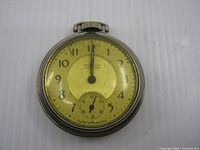 Front view of Westclox Pocket Ben pocket watch showing dial, hands, case condition
