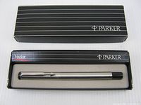 Pen in open Parker box with lid showing branding