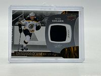 Front view of card showing player image and jersey swatch